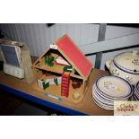 A Sylvanian dolls house and contents