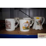 A quantity of various commemorative mugs