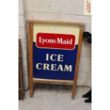 A "Lyons Maid Ice Cream" sign in wooden frame, approx. 34" x 21" wide in extremes