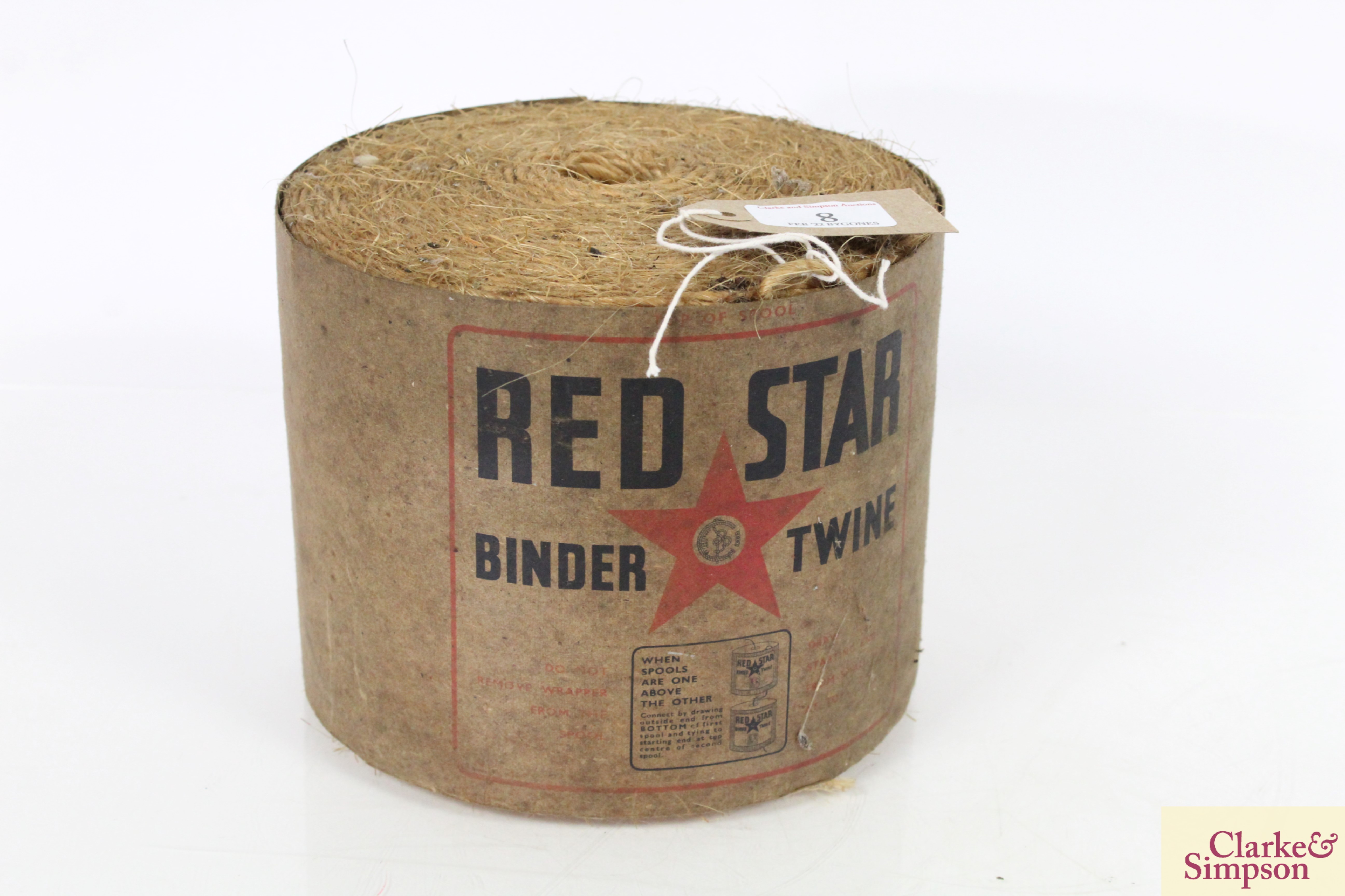 A roll of unused Red Star binder twine