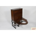 A 19th Century mahogany Moules patent Earth Closet Reg.No.383443 on cat iron base