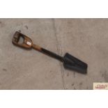A short handle drainage spade