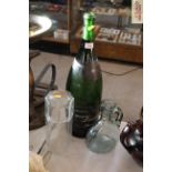 A vintage Champagne bottle, glass jug and a storag