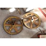 A pair of 17" cast iron wheels and axle