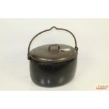 A cast iron Judge ware 4 gallon cauldron with swin
