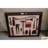 A display board of various cobblers tools includin