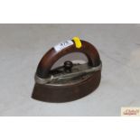 A Kendrick Mrs Potts flat iron with wooden detachable handle