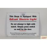 An "Edison Electric Light" sign, approx. 8" x 6"