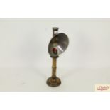 An antique brass students lamp
