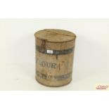 A vintage flour bin, measuring approximately 11 1/2 inches in diameter X 13 1/2 inches high.