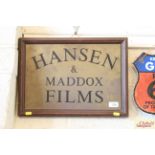 A brass and wooden framed Hansen & Maddox films si