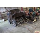 A four seater small pony carriage, 3'4" wide x 5'