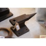 A small iron bench anvil