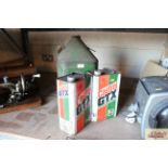 Two Castrol GTX fuel cans and a vintage BP fuel ca
