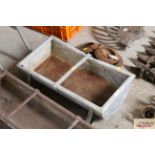 A vintage galvanised two section trough