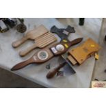 A wooden and ceramic lemon squeezer, a dough scrap