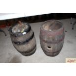 Two oak coopered and metal bound barrels