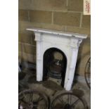 A Victorian cast iron fireplace