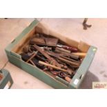 A tray box containing miscellaneous hand and wood