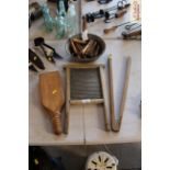 A vintage wash board, pair of Miele laundry tongs, a wash bat, a wash boiler scoop and a