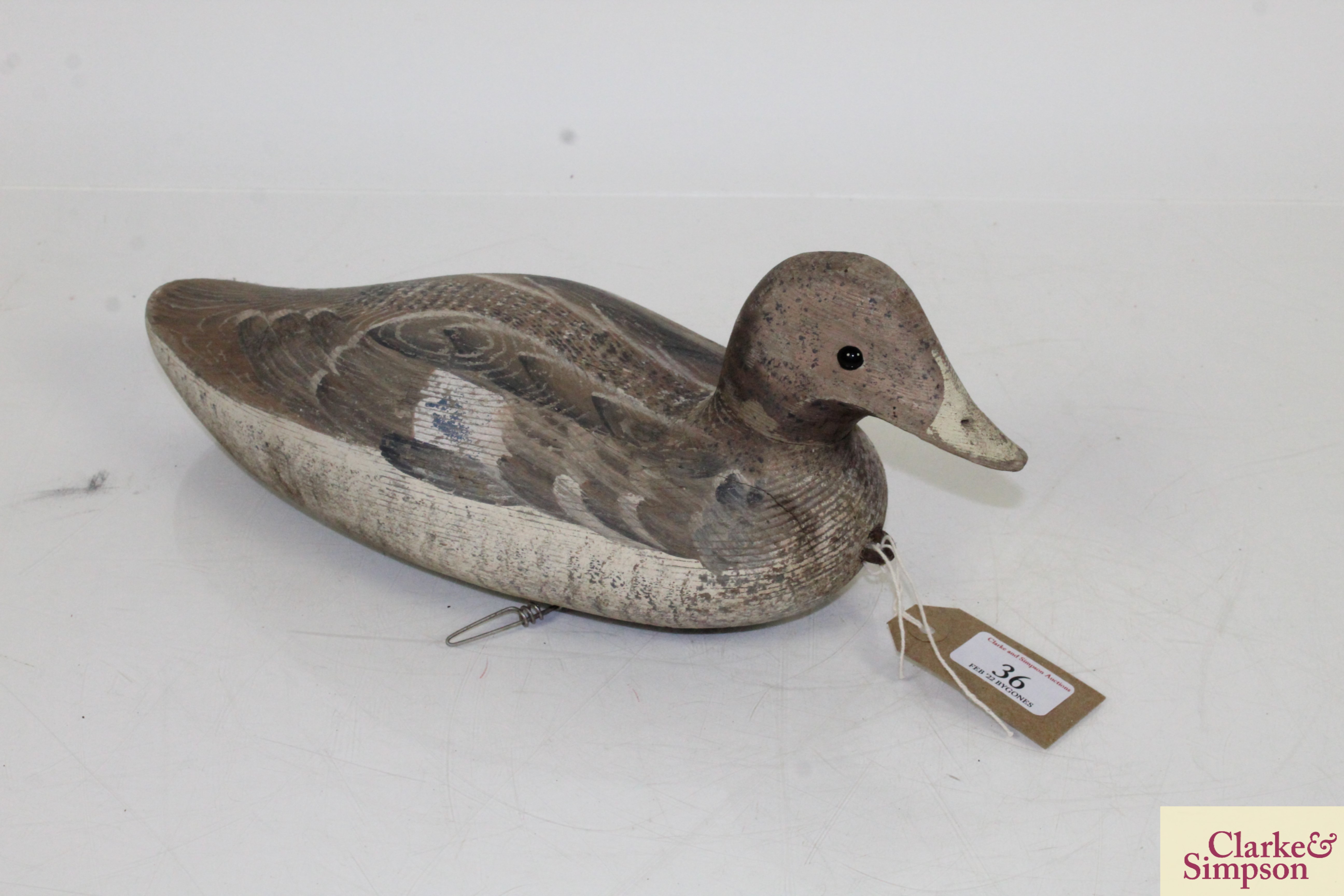 A vintage painted wooden decoy duck, approx. 13½" long