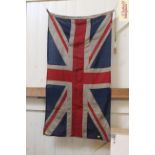 A vintage Union Jack flag, measuring approximately 54 inches wide X 27 inches tall.