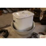 A vintage enamel bread bin and an enamel wash bowl