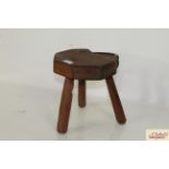 A vintage milking stool