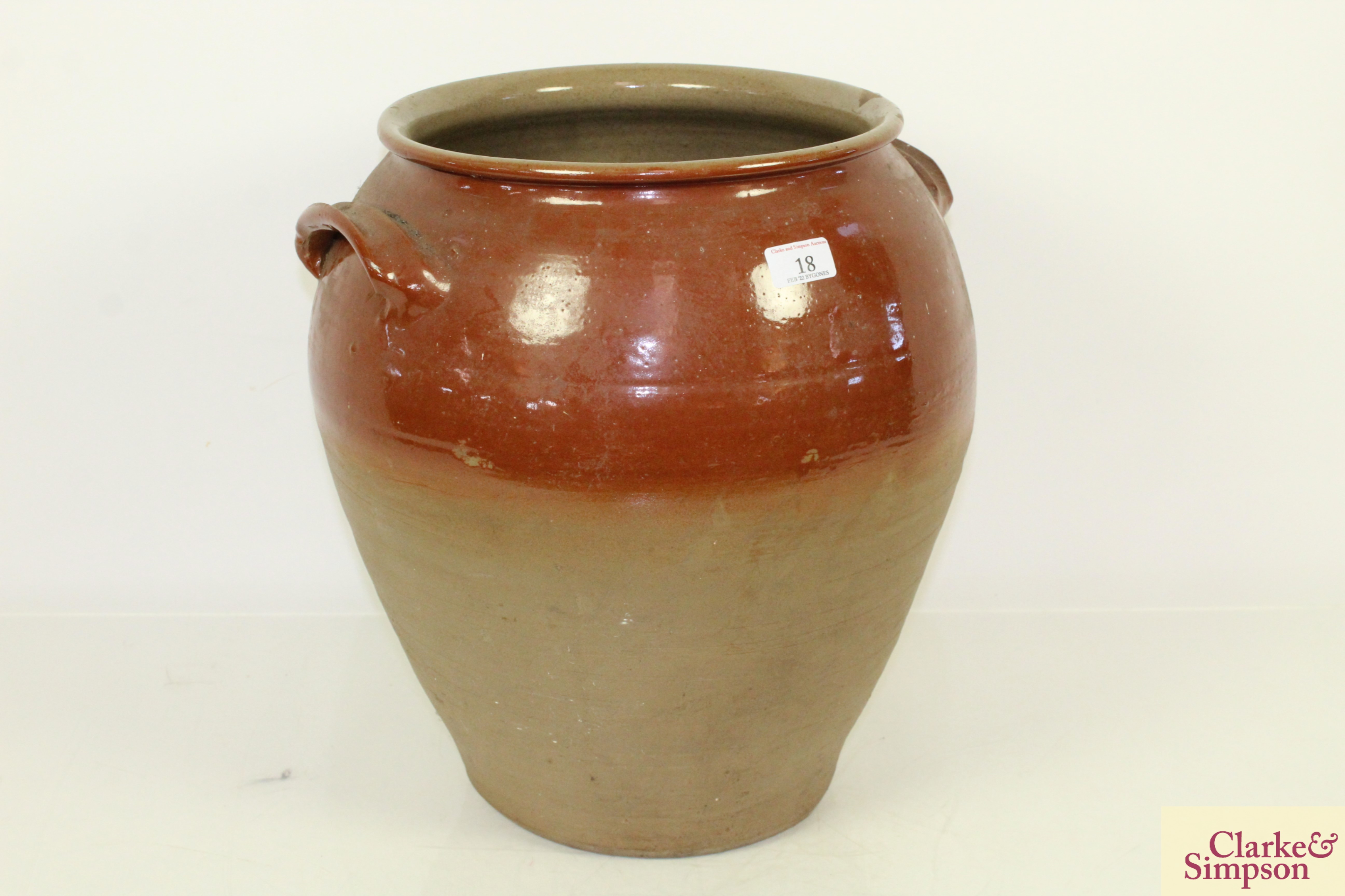 A glazed earthenware crock