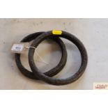 Two cast iron quoits