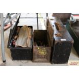 A wooden tool case, an ammunition box and a metal