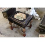 A Victorian carved pedestal and upholstered stool