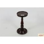 An early 19th Century mahogany candle stand