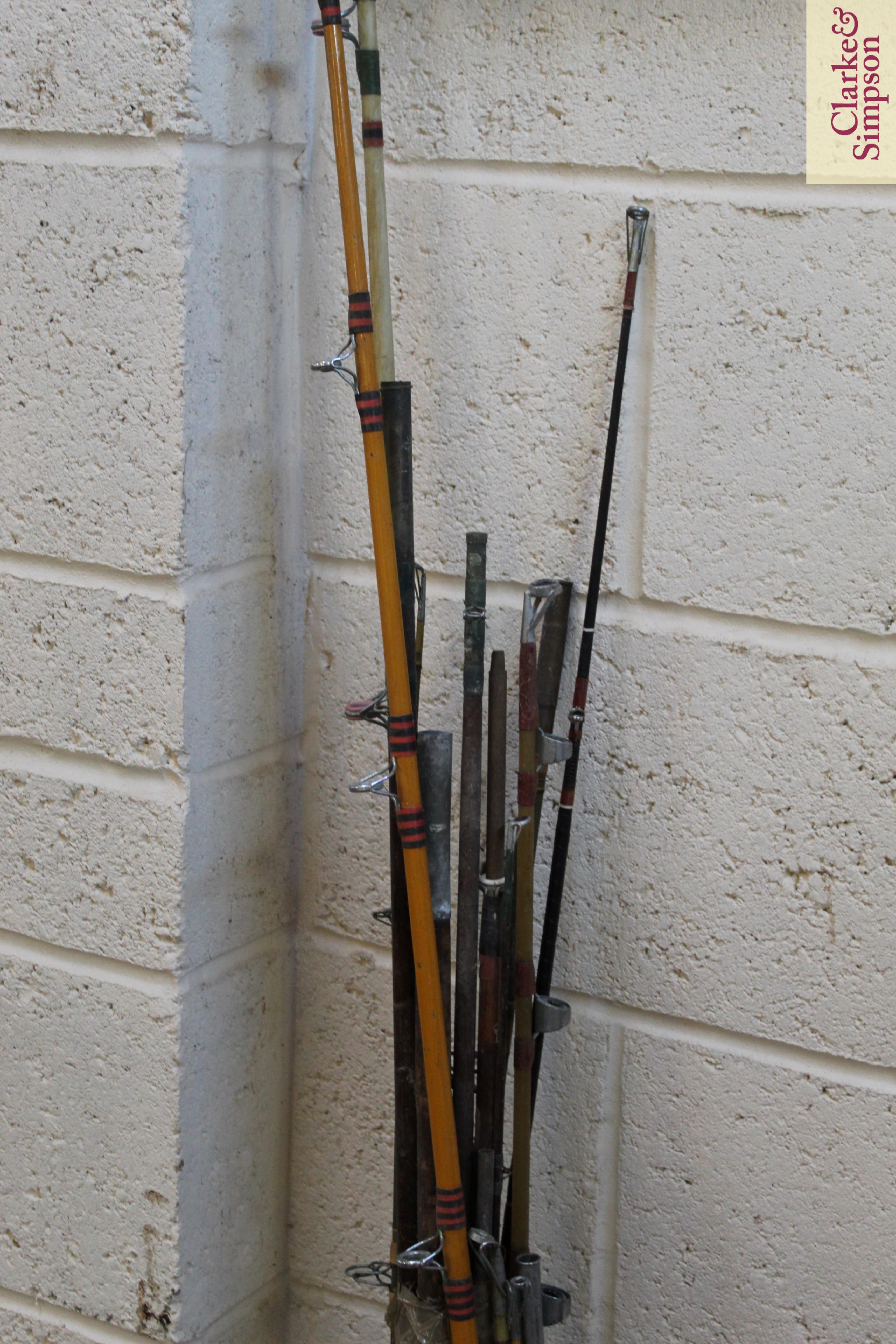 A bundle of fishing rods and various reels - Image 3 of 5