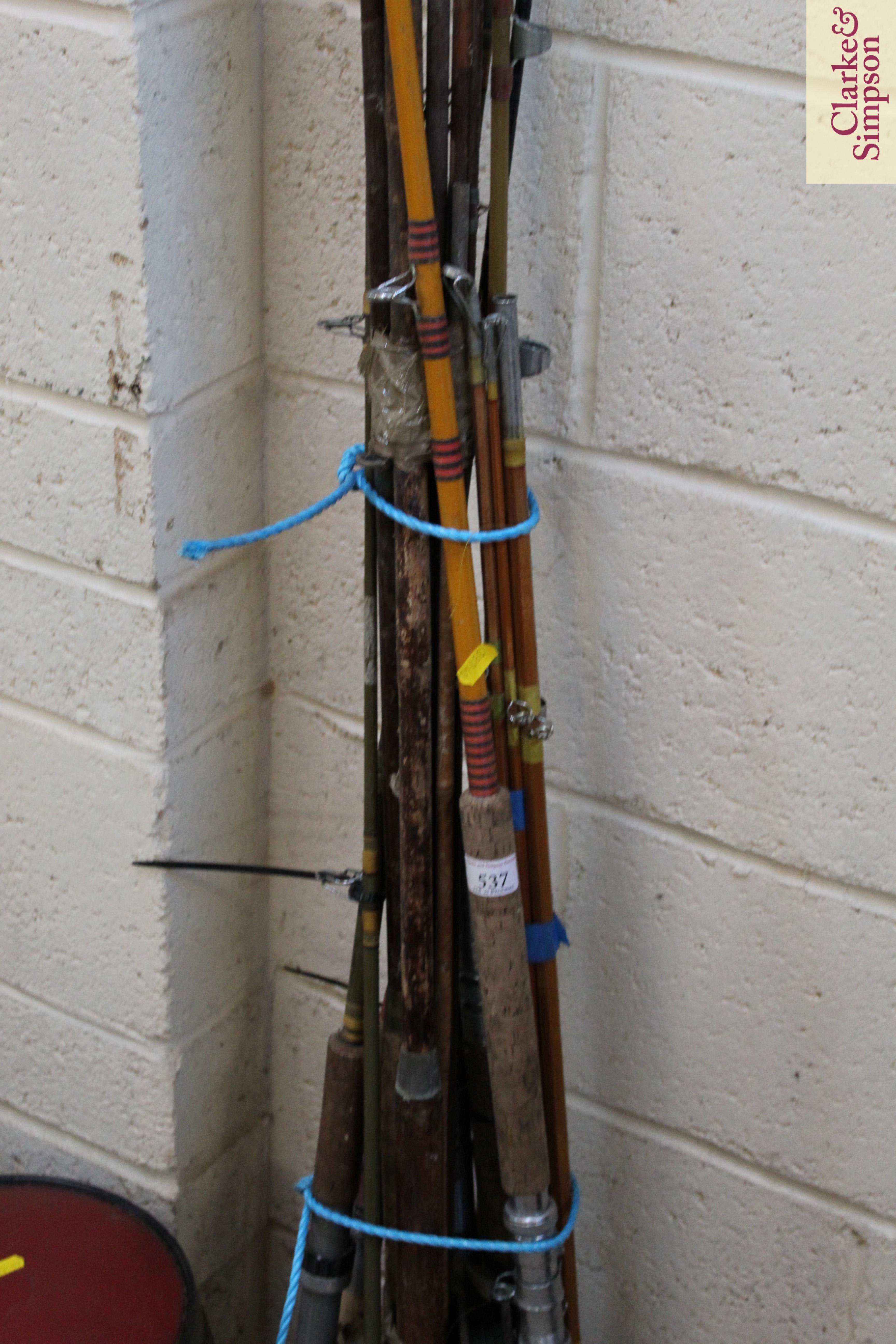 A bundle of fishing rods and various reels - Image 4 of 5