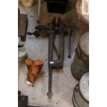 A vintage iron leg vice