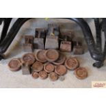 A collection of various cast iron weights