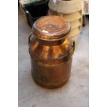 A coppered five gallon milk churn