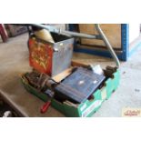 A tray box with contents to include a vintage biscuit tin, a Victorian ebonised and walnut banded