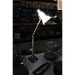 A vintage Angle Poise lamp with two step base