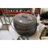 A large Clark & Co. 6 gallon cooking pot with swin