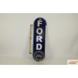 An enamel "Ford" advertising sign, approx. 36" long