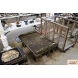 A four wheel metal and wooden Foundry cart made by