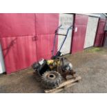 A Junior Auto-Culto Series U two wheel tractor. With replacement Briggs & Stratton engine, 2 sets of