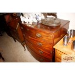 A Georgian mahogany bow fronted chest of four long