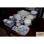 A collection of various blue and white china to in