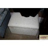 An upholstered ottoman