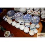 A quantity of blue and white willow pattern and ot