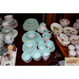 A quantity of Poole pottery twin tone dinner and t