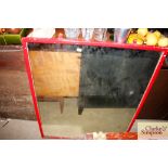 A red painted framed wall mirror